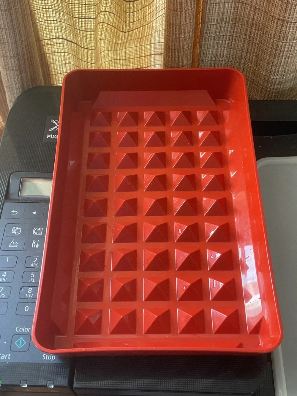 Tupperware bacon or hot dog keeper